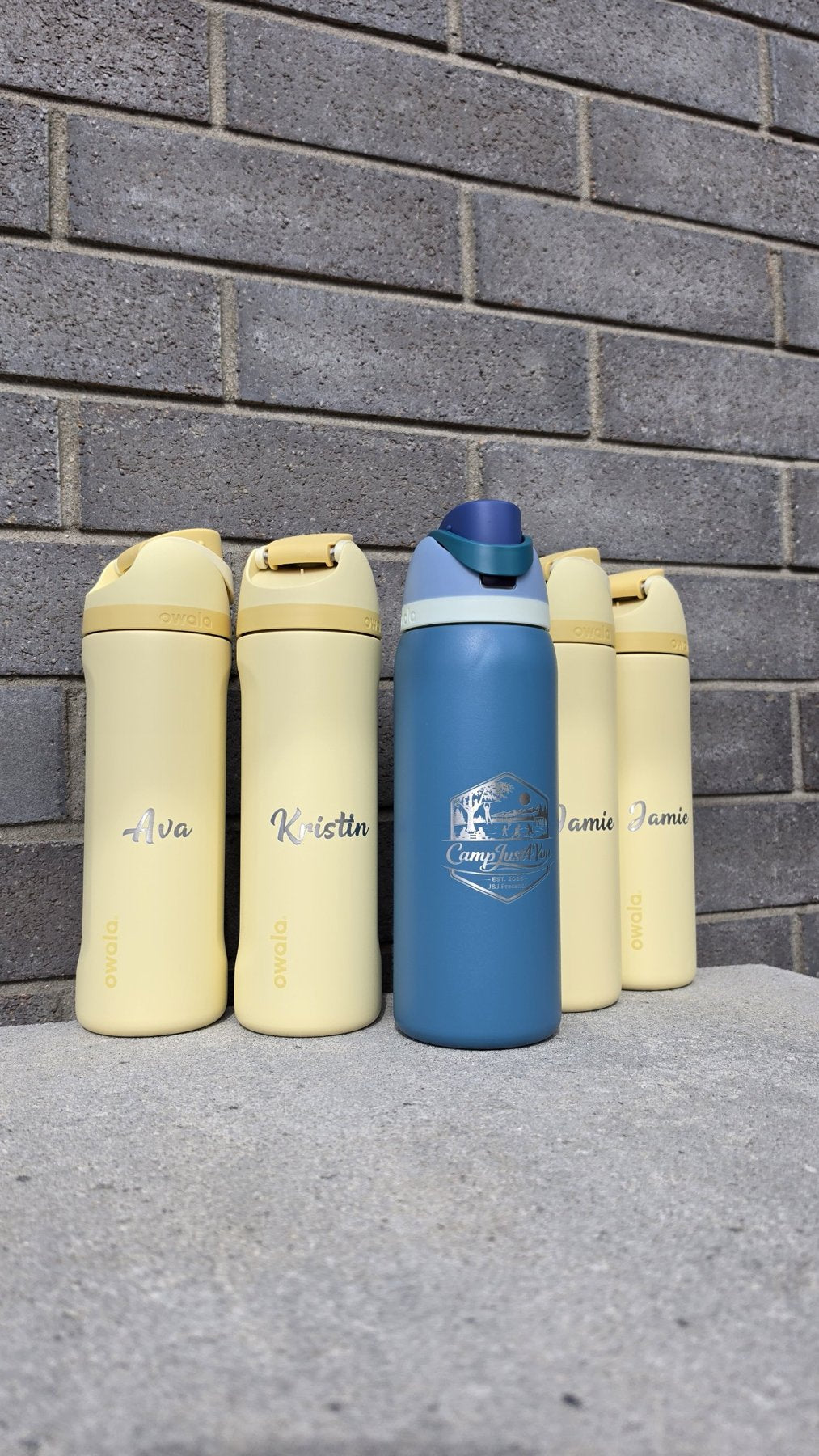 Owala bottles laser engraved with a logo