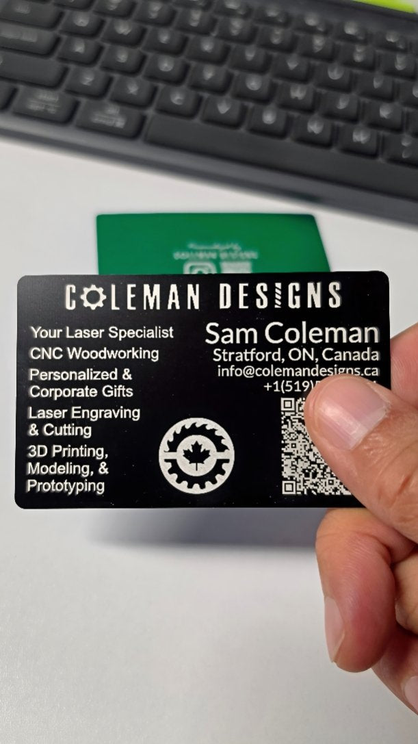 Laser engraved black metal business card